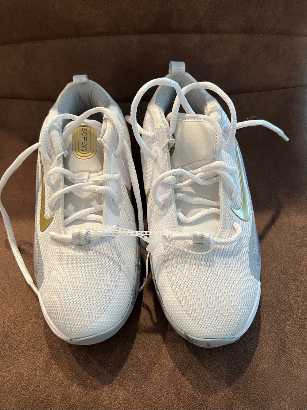 Nike Kids White Sneakers with Metallic Gold Swoosh